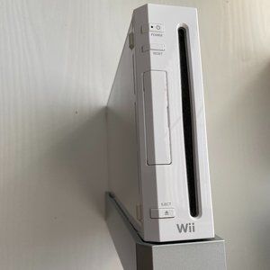 Nintendo Wii, 2 remotes, 1 nunchuck with joy stick